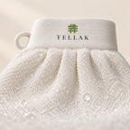 Close-up of the Tellak mitt's woven texture and ribbed cuff with logo